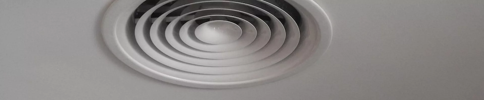 Round ceiling diffuser of an air conditioning system