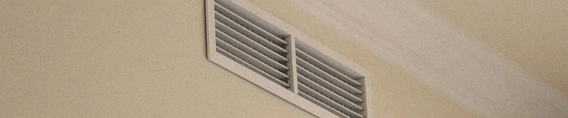 White air distribution grille in a living room on Mallorca